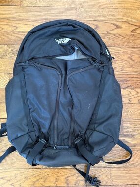 The North Face Black Backpack with Multiple Front Pockets